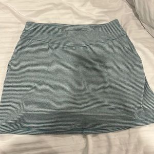 striped skort Built in spandex shorts 2pockets ifront 1 zip pocket back